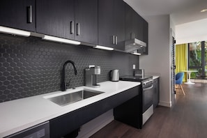 Fridge, microwave, stovetop, cookware/dishes/utensils