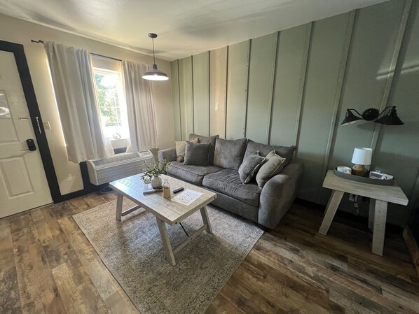 Chambre Confort | Coin séjour