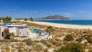 On the beach, sun loungers, beach towels