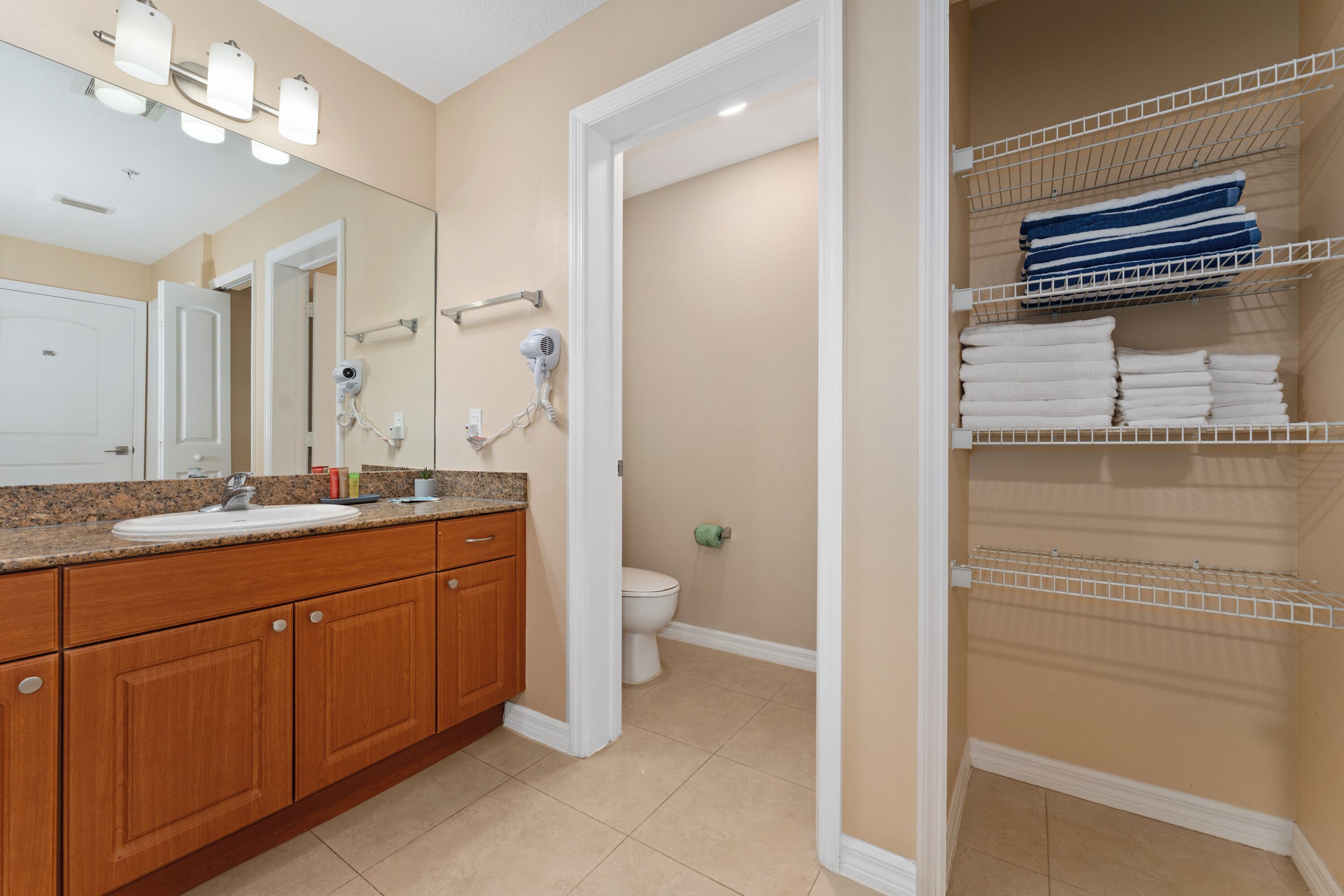 Hair dryer, towels, soap, toilet paper