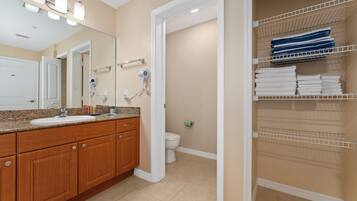 Hair dryer, towels, soap, toilet paper