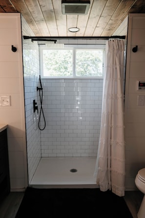 Shower, towels, soap, toilet paper