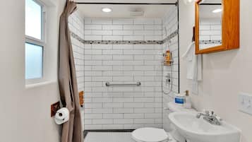 Shower, hair dryer, towels, soap