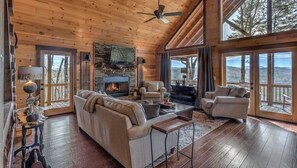 Smart TV, fireplace, table football, books