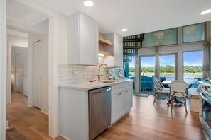 Villa, Multiple Beds, Patio (1605 Port Villas) | Private kitchen | Fridge, microwave, oven, stovetop