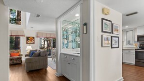 A modern kitchen with white cabinets, a built-in oven, and a microwave. - 242 Stoney Creek Villa at The Sea Pines Resort (Hilton Head Island)