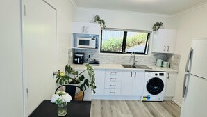 Unclassified image, 5 of 13, button - Waterfront studio unit near Auckland Airport (Auckland)