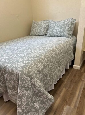 1 bedroom, desk, iron/ironing board, travel crib