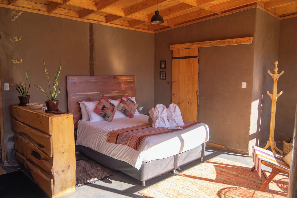 Exclusief huisje, 1 queensize bed, bubbelbad, uitzicht op bergen | 1 slaapkamer, luxe beddengoed, individueel gedecoreerd, beddengoed