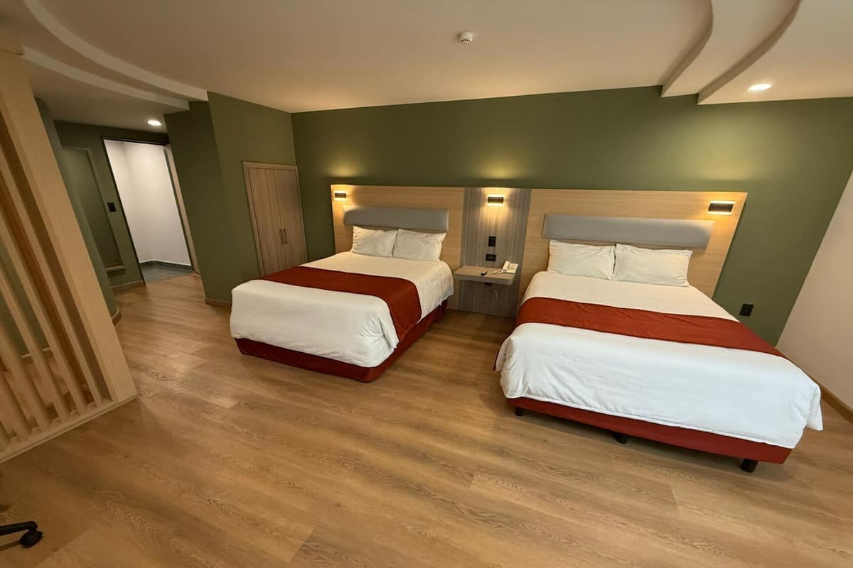 Standard Quadruple Room, Non Smoking | In-room safe, desk, laptop workspace, free WiFi