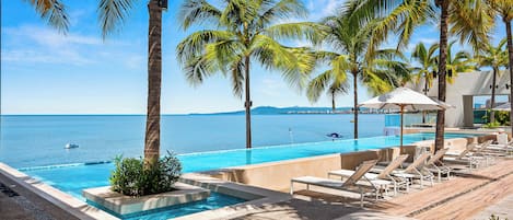 5 outdoor pools, pool umbrellas, pool loungers