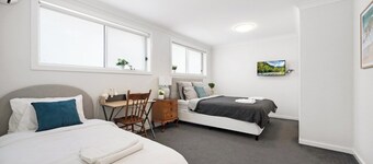 KozyGuru | Austral | Convenient 4 x Ensuite House