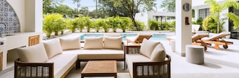 Luxury 7-Suite Villa in Playa Grande Steps to Beach | Pool & Lounge | Free Surfboards & Bikes