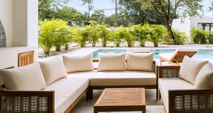 Luxury 7-Suite Villa in Playa Grande Steps to Beach | Pool & Lounge | Free Surfboards & Bikes