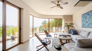 Căn hộ Deluxe, quang cảnh bãi biển | Khu phòng khách