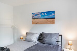 2 dormitorios, tabla de planchar con plancha, wifi gratis y ropa de cama