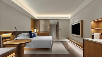 Habitación, 1 cama King size, vista a la montaña | Edredón y artículos del minibar gratis