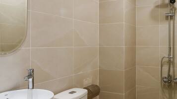 Shower, free toiletries, hair dryer, slippers