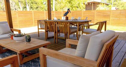 Stylish 3BR Southwest home for 6 near wineries, dining, and breweries. Features a chef’s kitchen, spacious living area, washer/dryer, and a private backyard with a unique guitar-shaped fire pit.