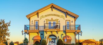 Cozy German-inspired 1BR retreat for 2 with private bath, kitchenette, patio, workspace, Wi-Fi, and breakfast vouchers. Perfect for romantic getaways, weekend escapes, or business stays in charming Muenster.