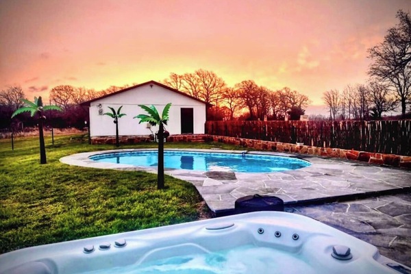 Relax and rejuvenate in our serene pool and hot tub oasis, where tranquility meets luxury.