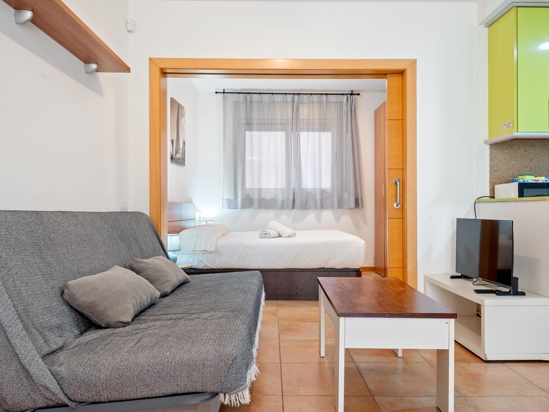 1 dormitorio, tabla de planchar con plancha, Internet y ropa de cama