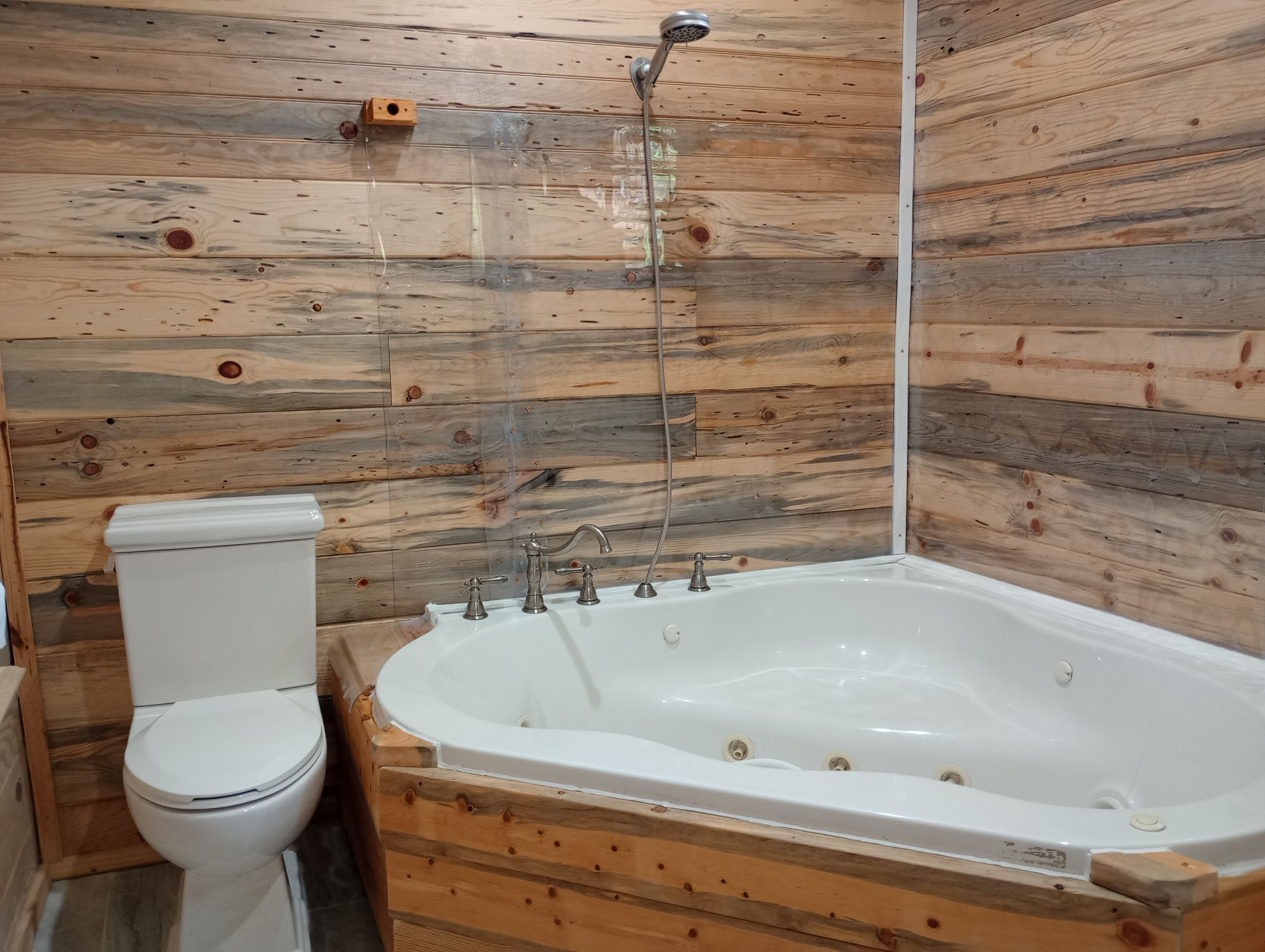 Jetted tub, hair dryer, towels, soap