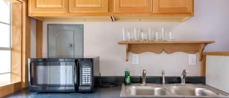 Fridge, microwave, coffee/tea maker, toaster