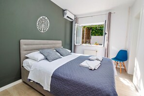4 bedrooms, iron/ironing board, travel cot, WiFi
