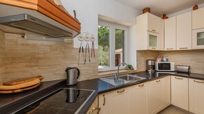 Refrigerador, microondas, horno y lavavajillas 