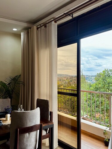 Stylish 2BR w/ Balcony & Fast Wi-Fi, City Views