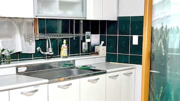 Fridge, microwave, cookware/dishes/utensils