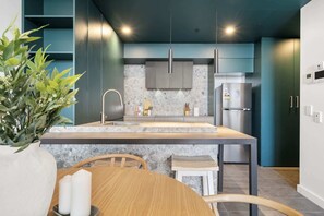 Fridge, microwave, oven, stovetop - Chic 1-Bed Escape in Fremantle with Parking (North Fremantle)