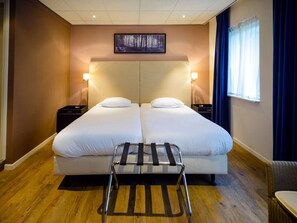 1 slaapkamer, een strijkplank/strijkijzer, gratis wifi, beddengoed