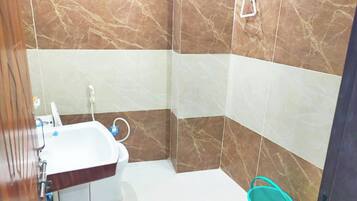 Superior Triple Room | Bathroom | Shower, free toiletries, slippers, soap