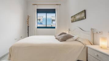 2 dormitorios, tabla de planchar con plancha, wifi gratis y ropa de cama