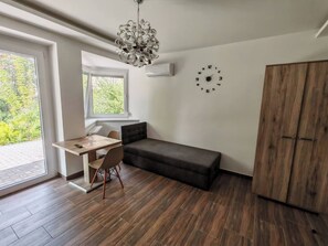 Apartment, 1 Bedroom, Smoking, Terrace | Living room - Charming Modern Furnished Studio in a Peaceful Neighborhood of Kecskemét (Kecskemet)