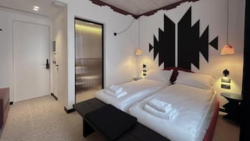 Premium bedding, down duvets, memory-foam beds, minibar