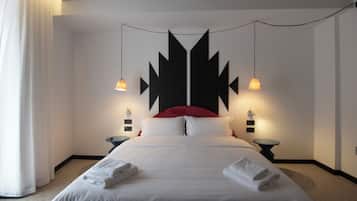 Premium bedding, down comforters, memory foam beds, minibar