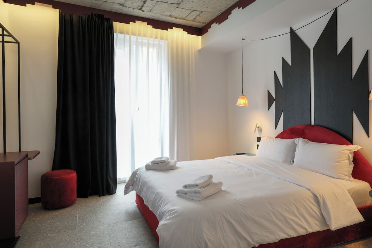 Premium bedding, down comforters, memory foam beds, minibar