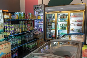 Convenience store offers a wide range of products, including dairy, beverages, snacks, and frozen items.