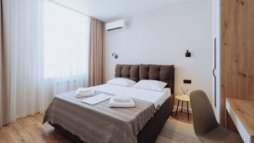 1 dormitorio, tabla de planchar con plancha, cuna de viaje y wifi gratis