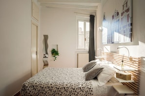 Apartamento, vista para o pátio | 1 quarto, ferros/tábuas de passar roupa, Wi-Fi de cortesia