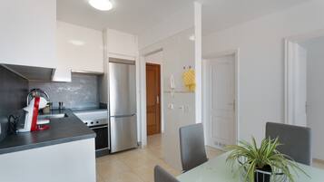 Fridge, microwave, stovetop, coffee/tea maker