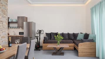 Deluxe Apartment, Hot Tub | Living area | 42-inch Smart TV with digital channels