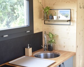 Fridge, microwave, stovetop, coffee/tea maker