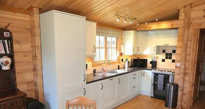 'Bullrush' luxury Log Cabin. 3.5 acre lakeside setting in Pewsey Vale Wiltshire