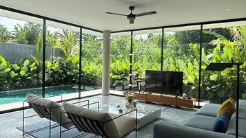 Two Bedroom Pool Villa with Fully Equipped Kitchen | Living area | 42-inch Smart TV with digital channels
