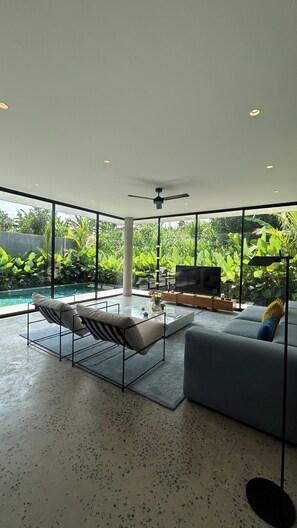 Two Bedroom Pool Villa with Fully Equipped Kitchen | Living area | 42-inch Smart TV with digital channels - Nova by OXO (Canggu)