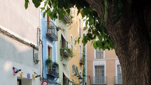 A quiet urban street with buildings, a tree, and a no-entry sign. - Castelar Suite, Villajoyosa Old Town, Seaview (La Vila Joiosa)